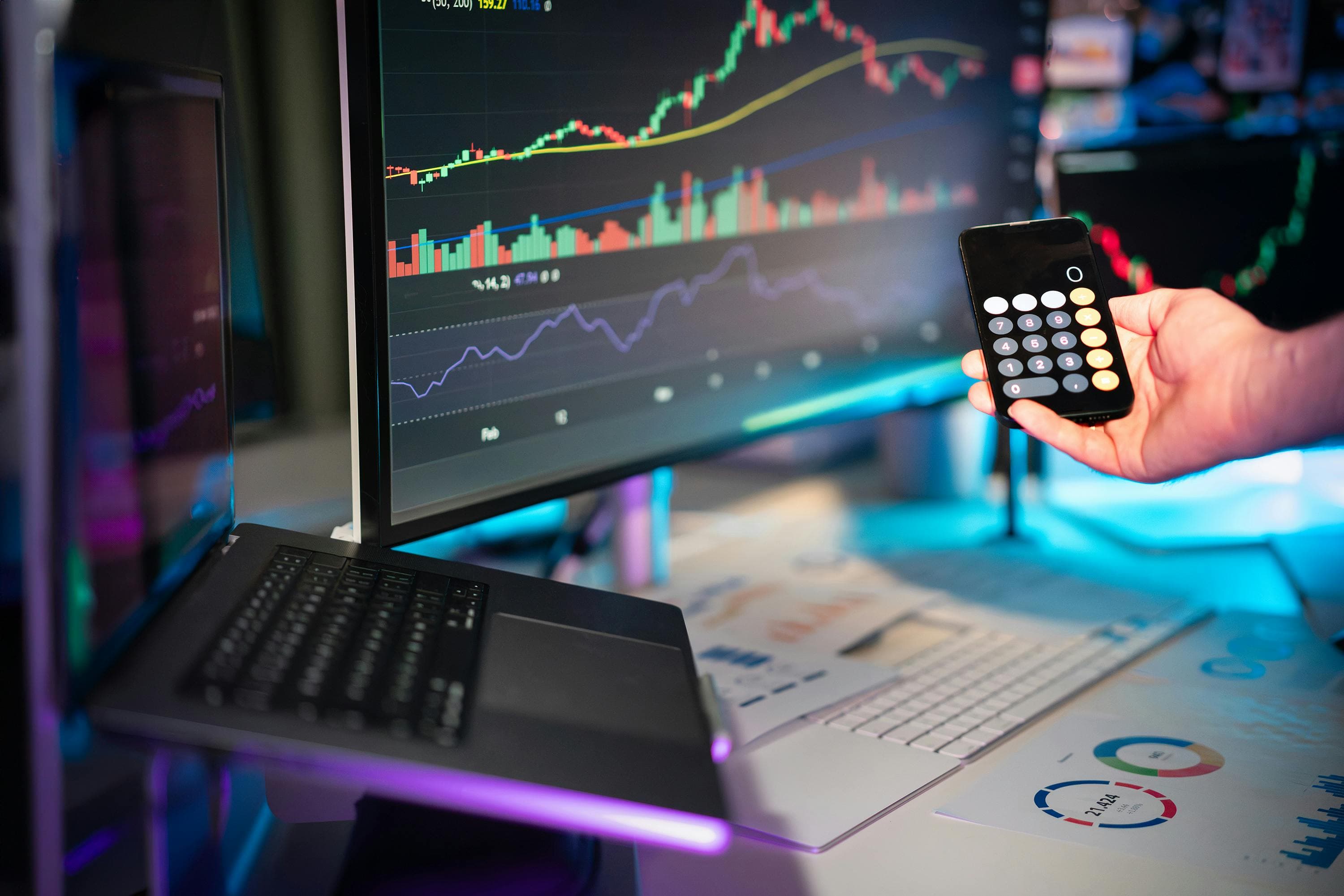 Live analytics dashboard with charts on a curved monitor.