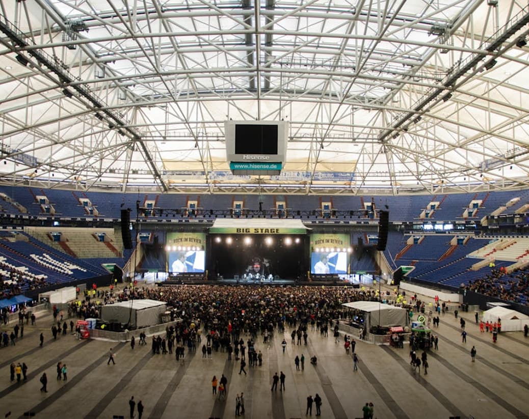 Stadium event venue with revenue and ticket-sale metric overlay